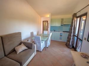 Kuchyň nebo kuchyňský kout v ubytování Appartamenti Il Borgo Porto Pollo 400 metri dal mare