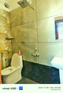 Koupelna v ubytování JOHNs' Paradise + 3 fotografie