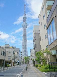 a view of the eiffel tower in a city at 良居民宿 YOSHII House 晴空塔徒步圈 整栋出租 in Tokyo