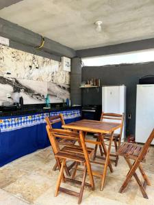 Η κουζίνα ή μικρή κουζίνα στο Pousada encantos morro branco