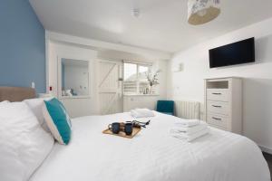 Voodi või voodid majutusasutuse Cape Cornwall Club toas