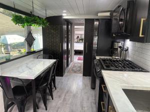 Gallery image of Sleek, Modern, Pet Friendly Custom Tour Bus! in Clermont +28 photos