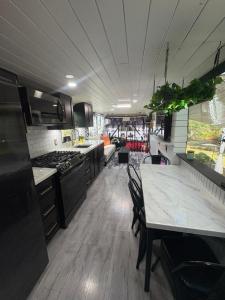 Gallery image of Sleek, Modern, Pet Friendly Custom Tour Bus! in Clermont