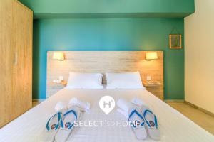 Voodi või voodid majutusasutuse SELECT'soHOME - T3 - Résidence avec piscine et cascade ! - CAPNAT-C03 toas