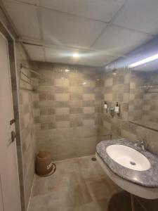 Un baño de Welcome Inn Boutique Hotel