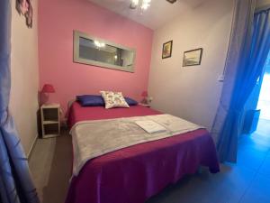 Postel nebo postele na pokoji v ubytování T2 avec balcon, clim, parking public proche - Balaruc-les-Bains - FR-1-503-75