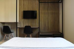 Телевизор и/или развлекательный центр в 4 Seasons Luxury Apartments