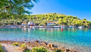 a large body of water with houses on a hill at #437 Status Relax Like a Boss in Biograd na Moru
