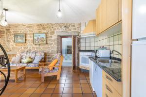 Η κουζίνα ή μικρή κουζίνα στο Casa Abuela Mercedes +31 φωτογραφίες