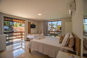 Ένα ή περισσότερα κρεβάτια σε δωμάτιο στο Vila Hayô +119 φωτογραφίες