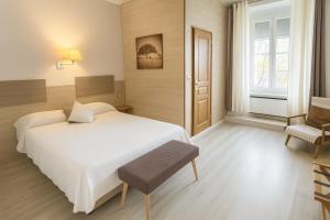 Postel nebo postele na pokoji v ubytování Hôtel du Nord