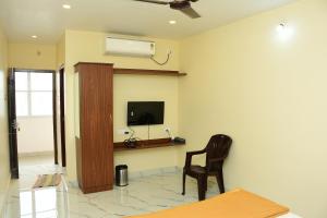 Μια τηλεόραση ή/και κέντρο ψυχαγωγίας στο Sri KASTHURI Residency +16 φωτογραφίες