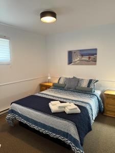 Ένα ή περισσότερα κρεβάτια σε δωμάτιο στο Bleuzen chalet entier