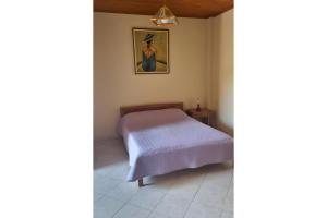 Postel nebo postele na pokoji v ubytování Captain's Dion Apartments