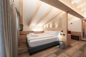 Postel nebo postele na pokoji v ubytování Spires Hotel