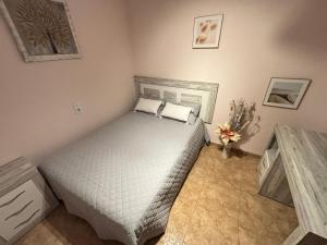 Ένα ή περισσότερα κρεβάτια σε δωμάτιο στο Apartamento elegante junto al mar- Vinarós