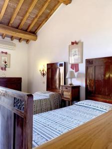 Ένα ή περισσότερα κρεβάτια σε δωμάτιο στο Dimora Le Galere - Pool & Relax +78 φωτογραφίες