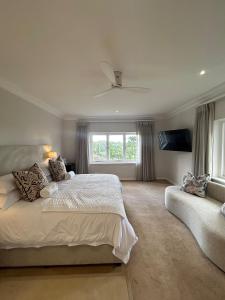 Postel nebo postele na pokoji v ubytování 7 on Churchill Guest House