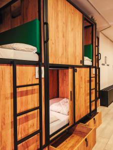 a hostel with bunk beds in a room at Capsule Inn Madrid in Madrid +61 photos