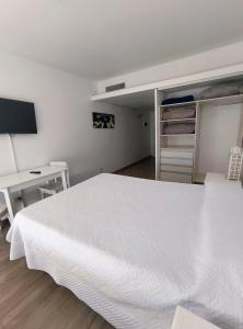 Giường trong phòng chung tại Departamento para tres BA +2 ảnh