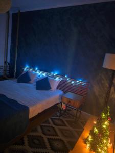 Un pat sau paturi într-o cameră la Mery