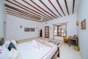 Postel nebo postele na pokoji v ubytování NEST in pongwe + 23 fotografií