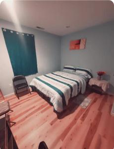 Ένα ή περισσότερα κρεβάτια σε δωμάτιο στο Room in a mansion