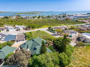 an aerial view of a town with houses and the ocean at Prima Rosa Langebaan - seaviews in Langebaan