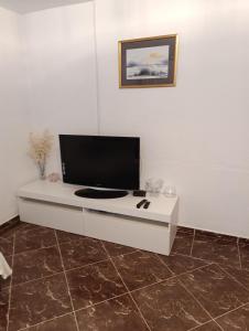 TV a/nebo společenská místnost v ubytování Apartman Kepić