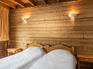 Ένα ή περισσότερα κρεβάτια σε δωμάτιο στο Superbe appartement au centre, proche pistes & commerces, 6 pers, WIFI - FR-1-519-21