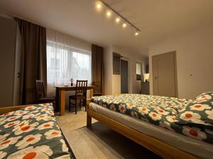 Postel nebo postele na pokoji v ubytování Pokoje gościnne Denega