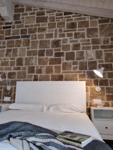 Ένα ή περισσότερα κρεβάτια σε δωμάτιο στο Casa Rural Lorehonea +32 φωτογραφίες