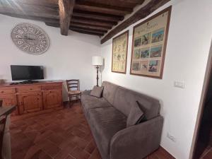 Μια τηλεόραση ή/και κέντρο ψυχαγωγίας στο Casa Di Via Del Corallo - Apartment