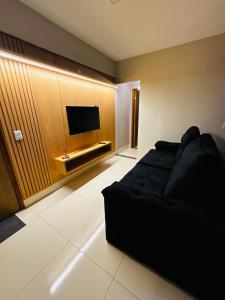 TV a/nebo společenská místnost v ubytování Apartamento Morais