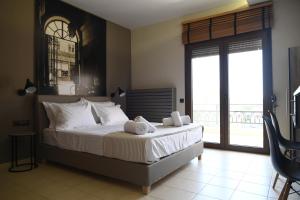 Кровать или кровати в номере 4 Seasons Luxury Apartments