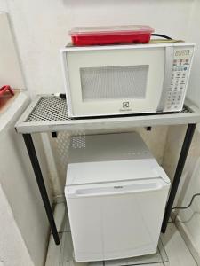 Η κουζίνα ή μικρή κουζίνα στο Kitnet