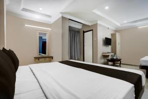 Voodi või voodid majutusasutuse Hotel O ANNAPURNA RESIDENCY toas