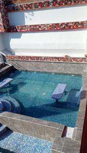 Bazén v ubytování Hotel Magico del Mar nebo v jeho okolí