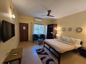 Postel nebo postele na pokoji v ubytování Arohha