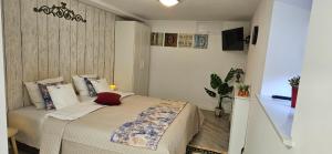 a bedroom with a bed in a room at Willa Joanna in Gdańsk +65 photos