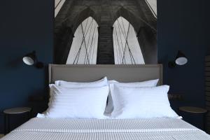 Кровать или кровати в номере 4 Seasons Luxury Apartments