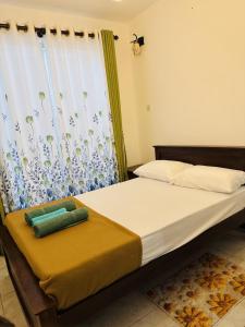 Postel nebo postele na pokoji v ubytování 35-B-5 Kandy