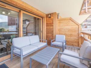 a living room with two chairs and a couch at Appartement moderne, Alpe d'Huez, 6 pers, cosy et pratique - FR-1-645-87 in L'Alpe-d'Huez