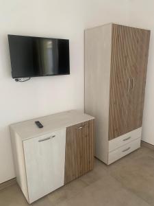 Μια τηλεόραση ή/και κέντρο ψυχαγωγίας στο President Apartment Premium Lakeview