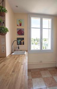 Una cocina o cocineta en Charming apartment - 4P 6 fotos más