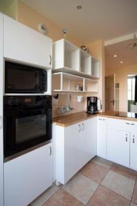 Una cocina o cocineta en Charming apartment - 4P