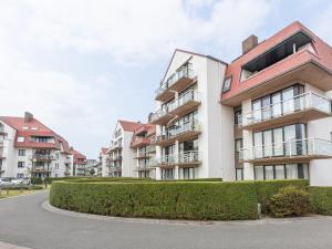 une image d'un immeuble d'appartements dans l'établissement Green Garden blok 1 - 0105, à Miami Wijk