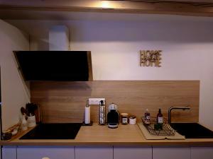 Kuchyň nebo kuchyňský kout v ubytování Sweet Home + 12 fotografií