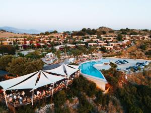 an aerial view of a resort with a pool at ARAMERAS Resort in Ksamil