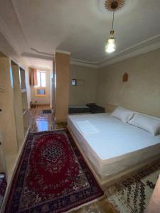 Ένα ή περισσότερα κρεβάτια σε δωμάτιο στο Auberge Soleil Bleu